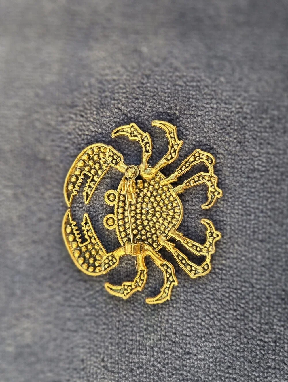 Gold-Tone Red Crystal Crab Brooch with Blue Accents